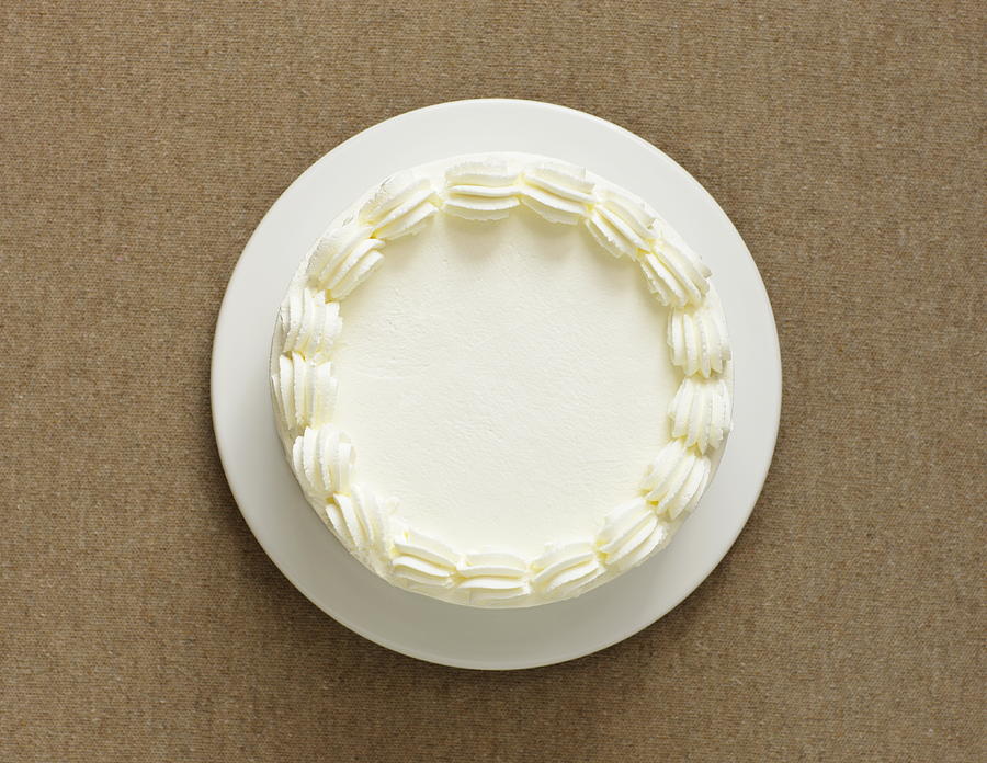White cake decorated whipped cream,aerial view Photograph by Sot