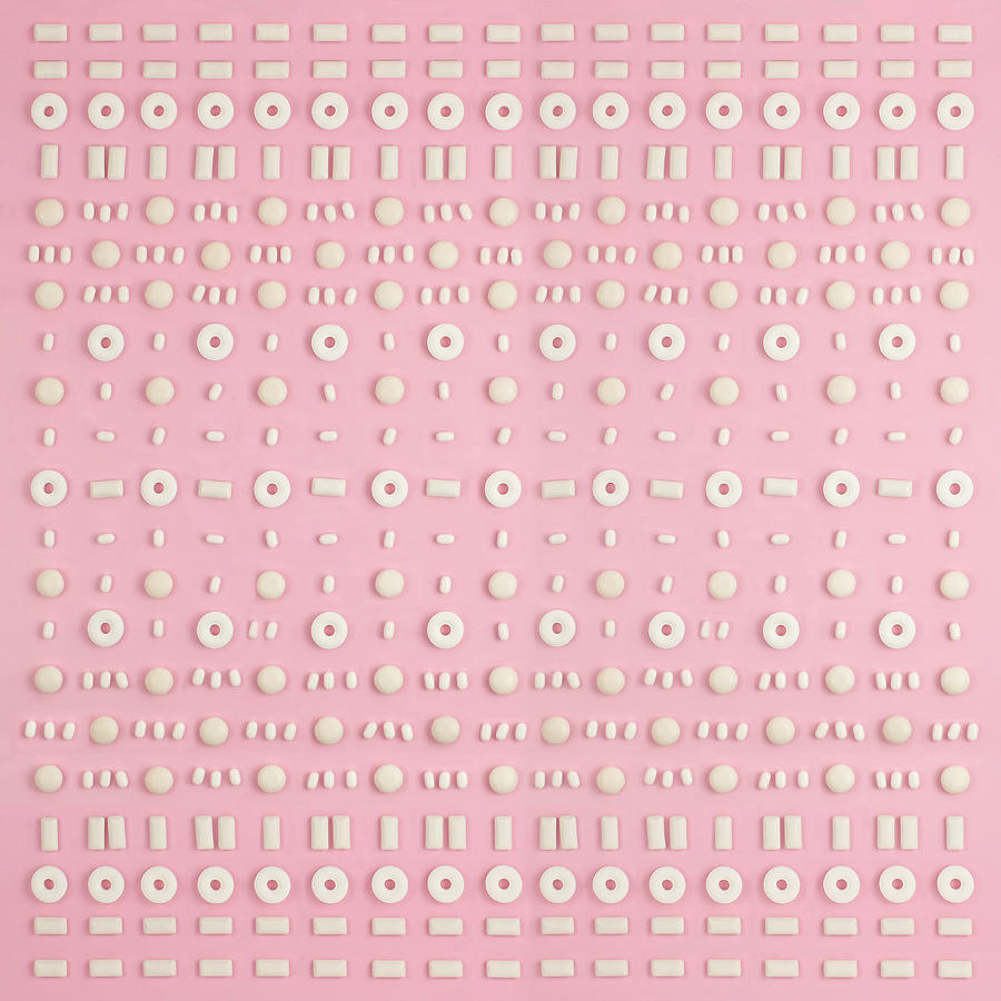White Candies Arranged In A Pattern Photograph by Juj Winn