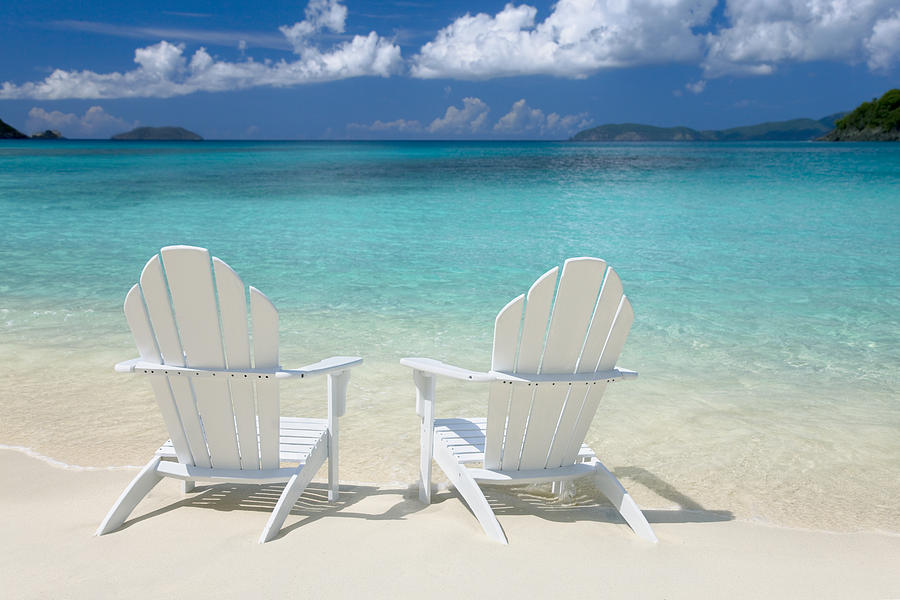 white chairs on the Caribbean beach Photograph by Cdwheatley
