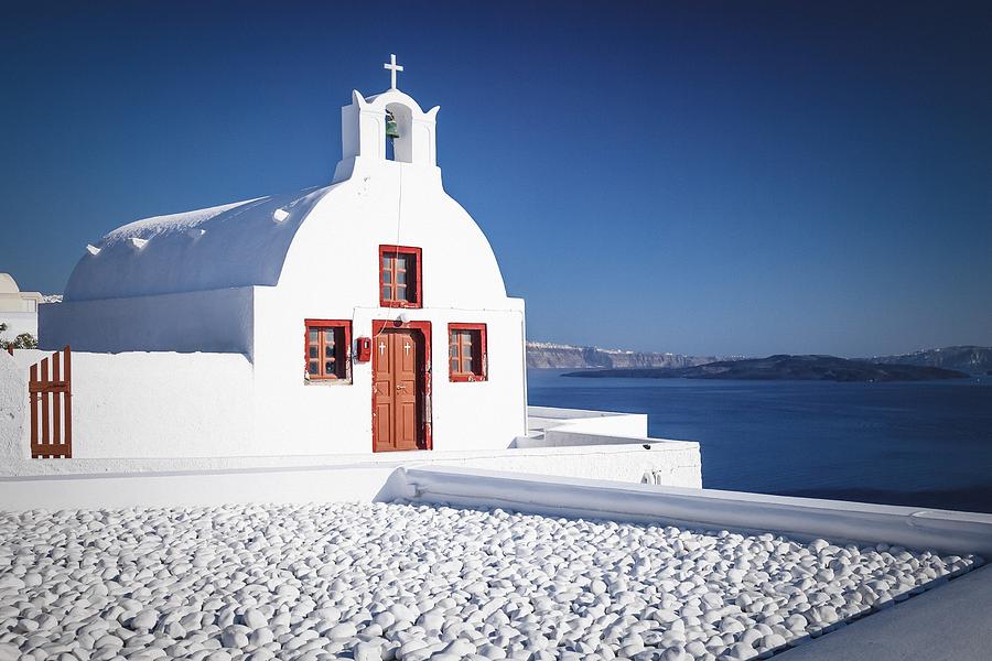Architecture Photograph - White Chapel in Santorini by Bjoern Kindler