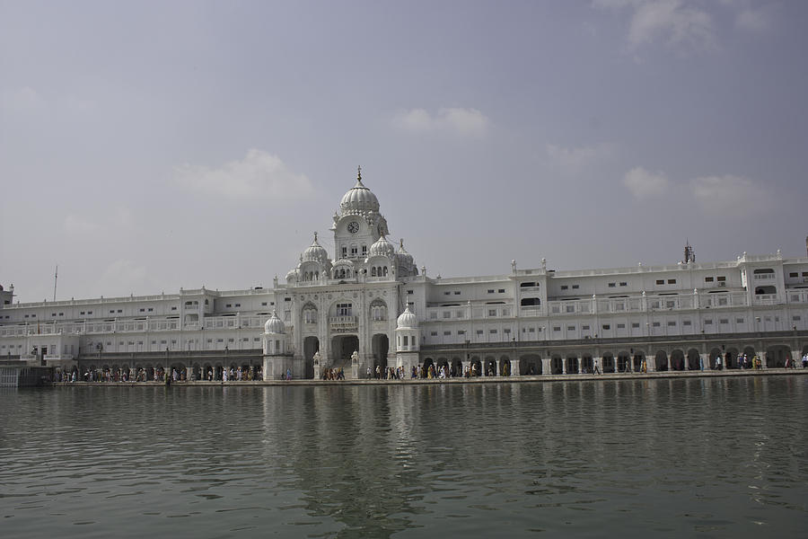 White clocktower building inside the Golden Temple Photograph by Ashish Agarwal
