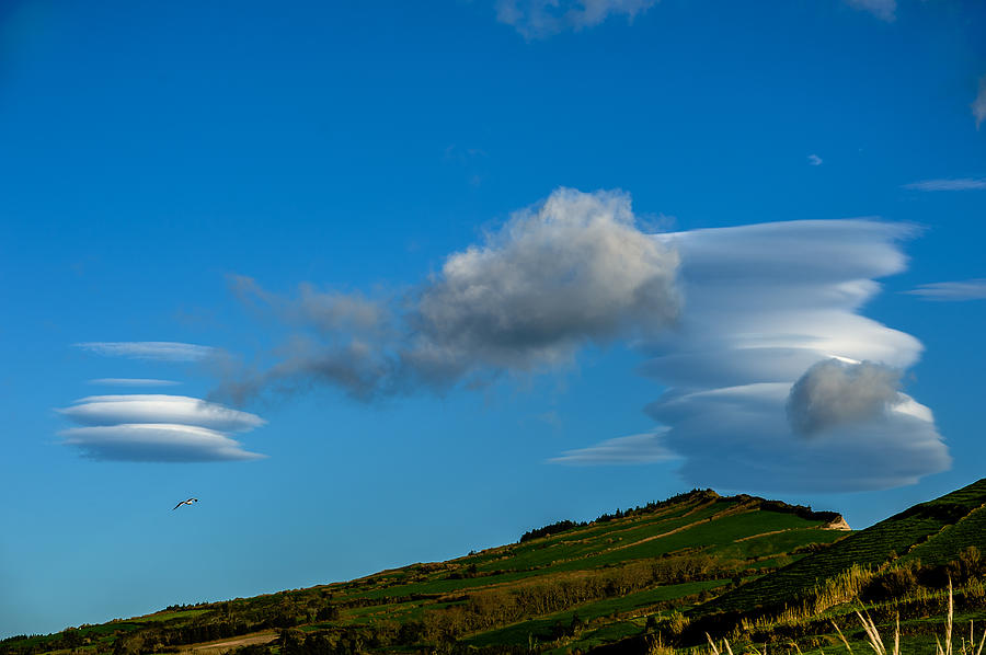 White Clouds Swirl Photograph by Joseph Amaral