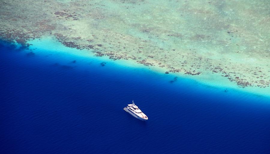 White Diving Boat Staying at Coral Reef Photograph by Jenny Rainbow