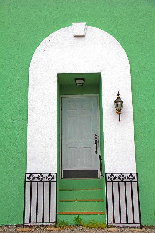 White door with green walls Photograph by Andy Lawless
