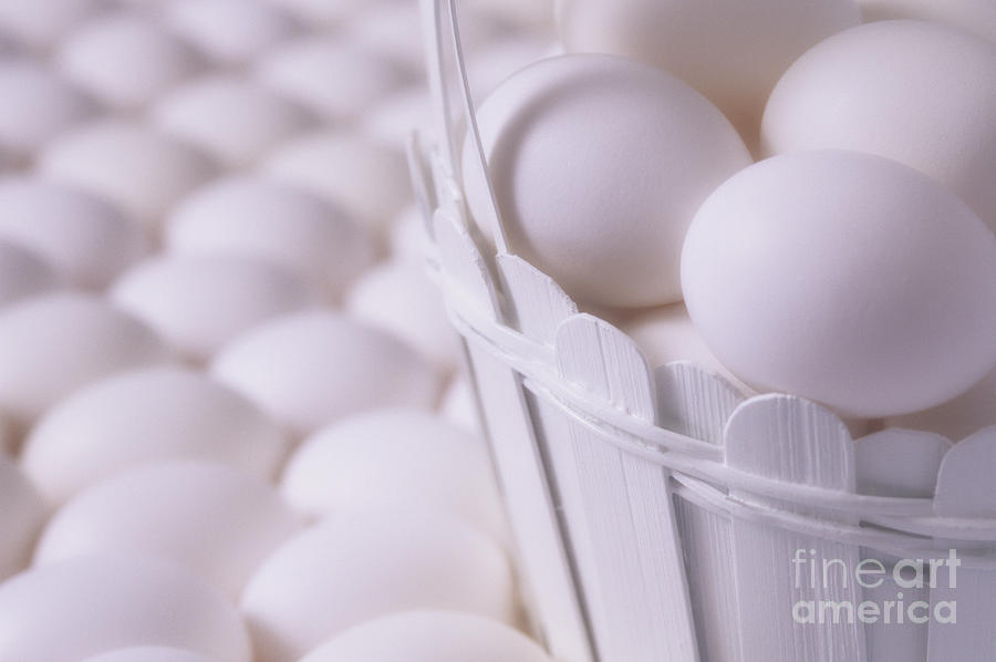 White eggs in white basket Photograph by Jim Corwin