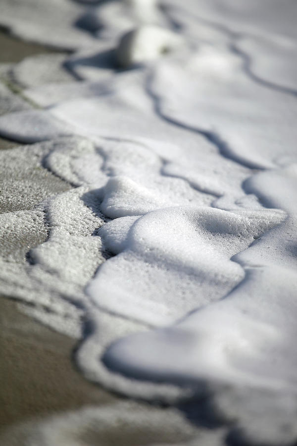White Foam At The Shoreline Photograph by Marcel Ter Bekke