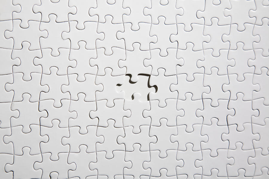 White jigsaw puzzle with one piece missing (full frame) Photograph by Ultra.f