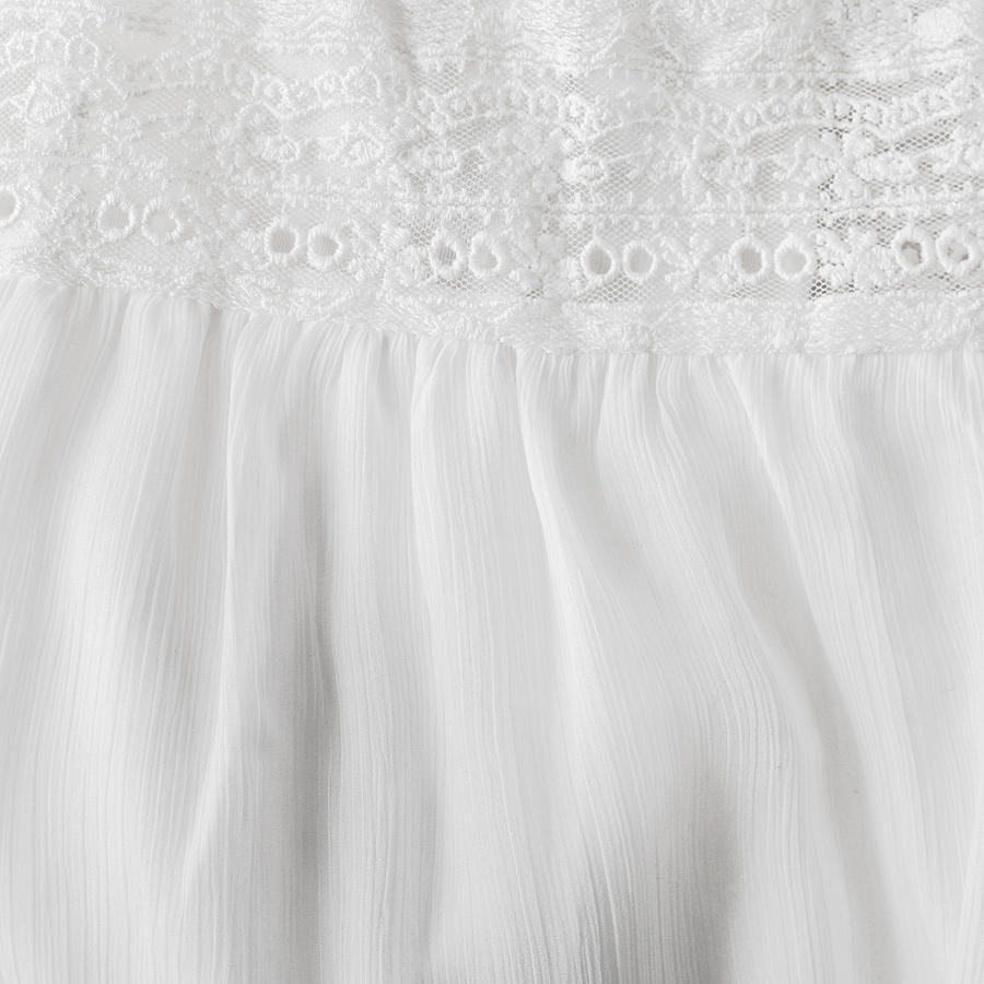 Space Photograph - White lace and satin by Tom Gowanlock