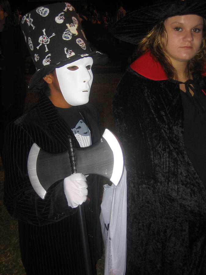 White mask holds court at Halloween in Casa Grande Arizona 2005 Photograph by David Lee Guss