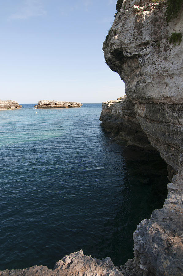 Minorca south coast rocks in Alcafar beach rounded with a turquoise mediterranean sea - White rocks Photograph by Pedro Cardona Llambias