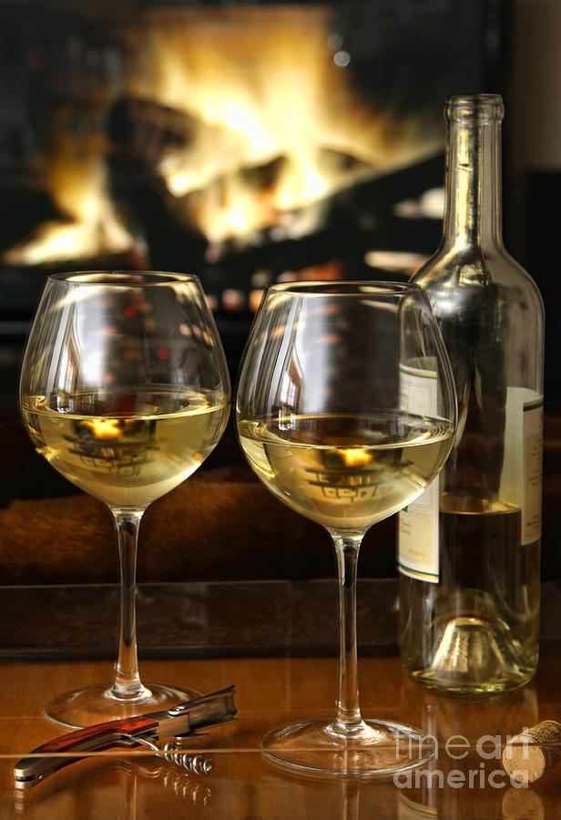 White wine in front of a warm fire Photograph by Sandra Cunningham