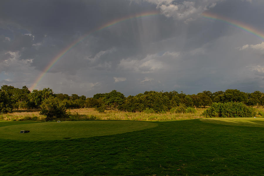 White Wing rainbow Photograph by John Johnson