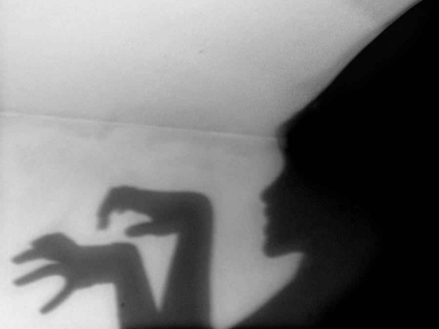 Wicked female shadow on the wall Photograph by Celeste Romero Cano