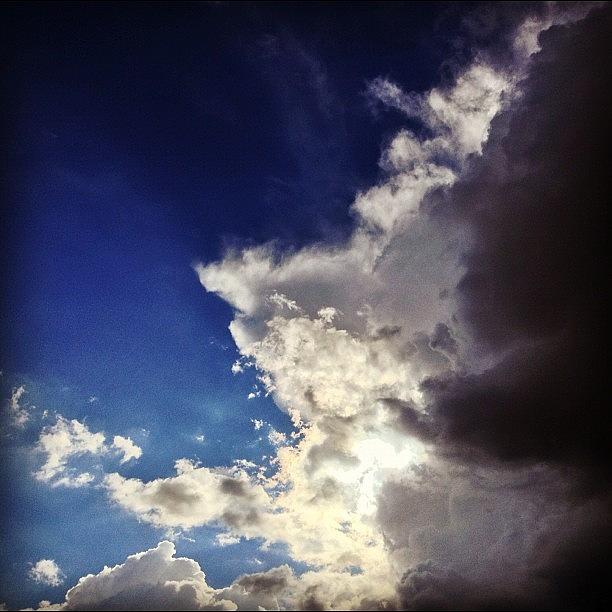 Blue Photograph - Wicked Sky. #clouds #sky #blue #sun by Victor Varela
