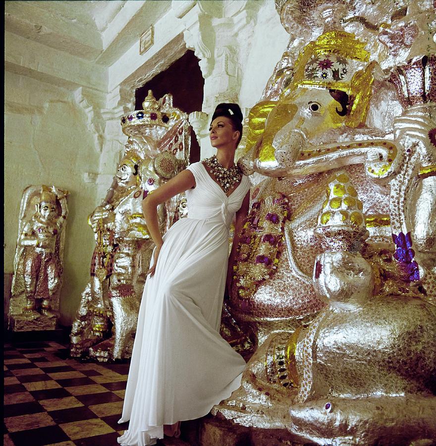 Wilhelmina Wearing A Malcolm Starr Dress Photograph by Henry Clarke
