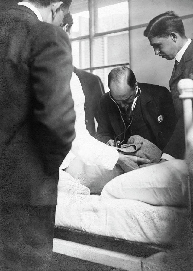 William Osler Attending A Patient Photograph by National Library Of Medicine