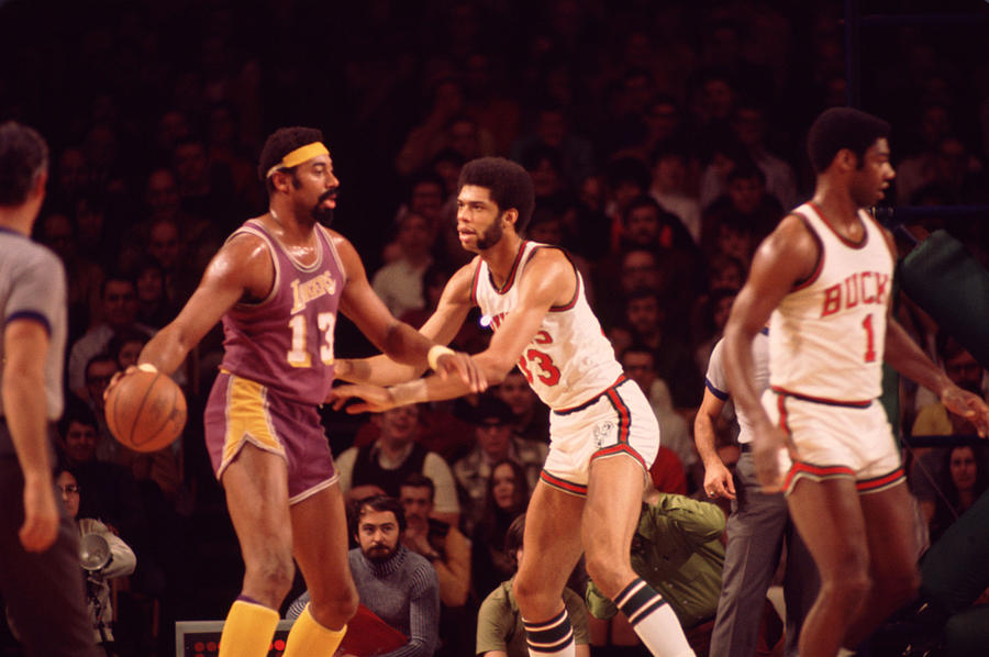 Wilt Chamberlain Guarded By Kareem Abdul Jabbar Photograph by Retro Images Archive