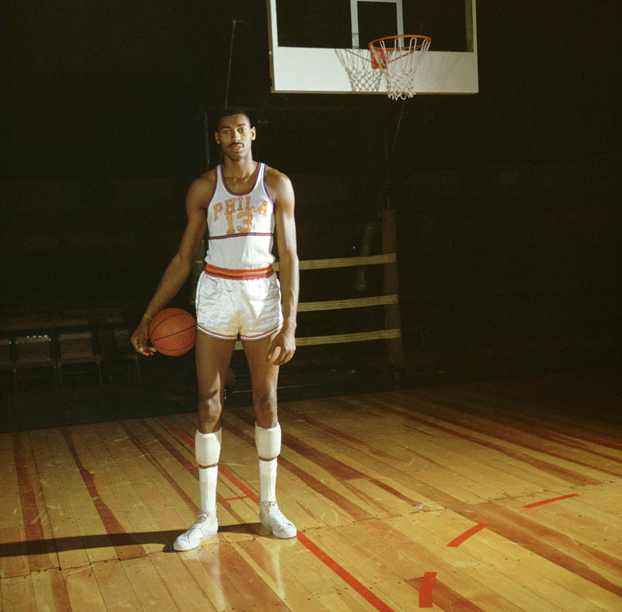 Philadelphia 76ers Photograph - Wilt Chamberlain Stands Tall by Retro Images Archive