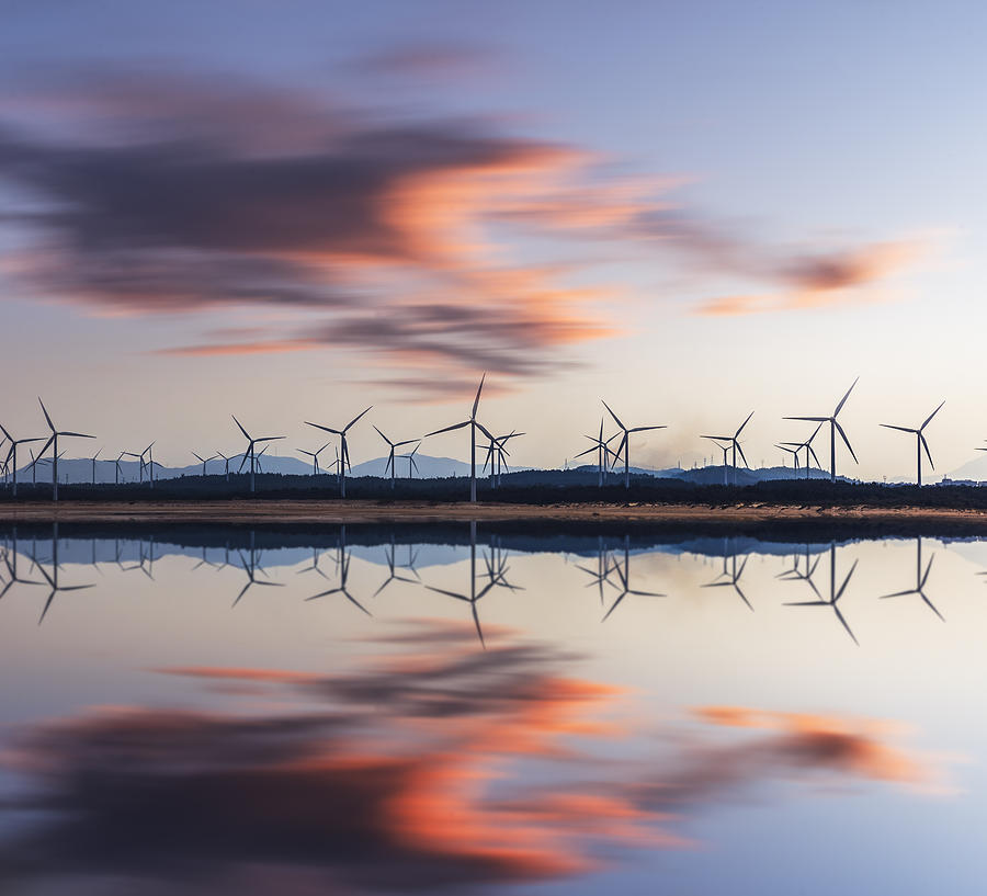 Wind Turbine And Electrical Towers On Sunset Photograph by Chinaface