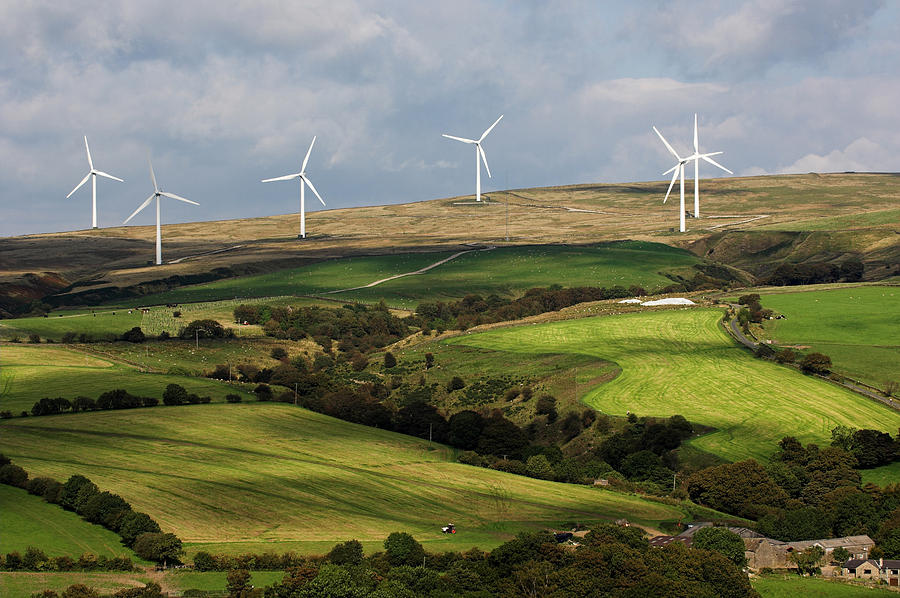 Wind Turbines On Farmland And Moorland Photograph by Wayne Hutchinson