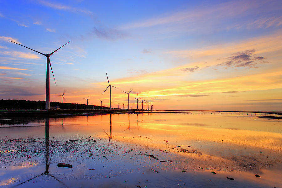 Wind Turbines On Wetland During Sunset Photograph by Samyaoo