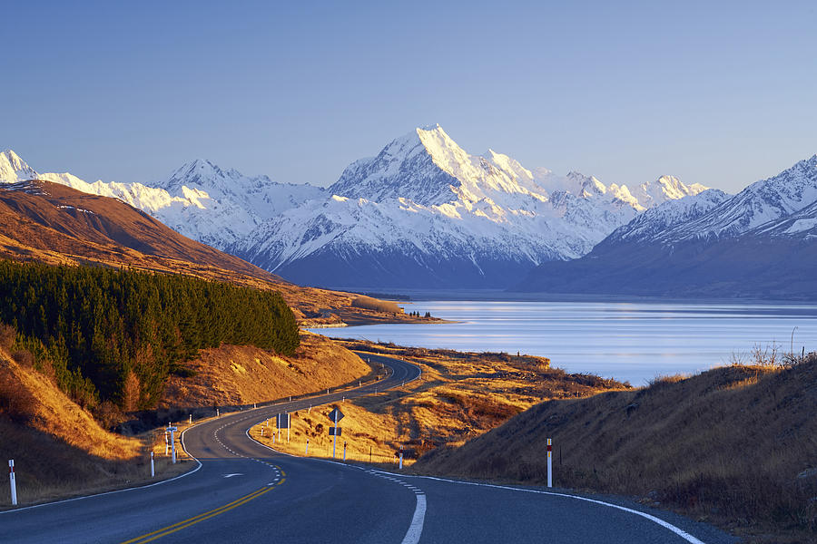 Winding road leading to Mount Cook Village, Canterbury, South Island, New Zealand Photograph by NurIsmailPhotography