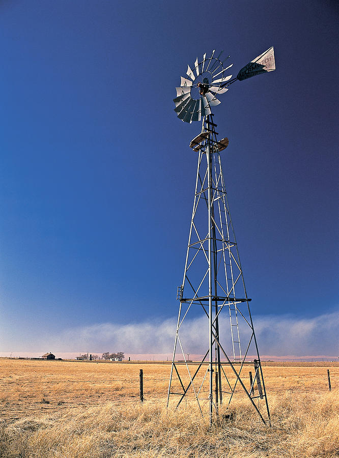 Windmill And Dust Storm Photograph by Kenneth Murray