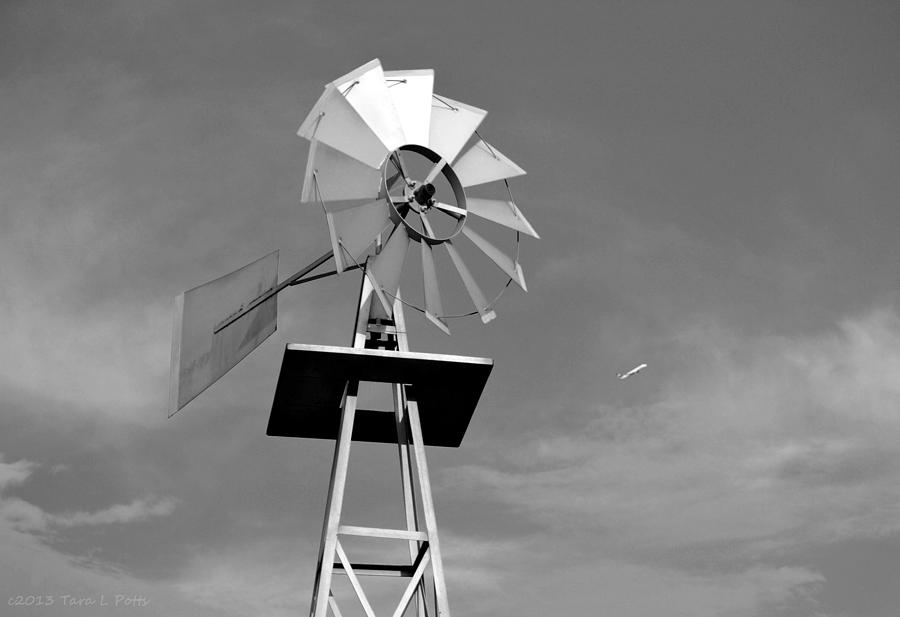 Windmill and Passing Plane Photograph by Tara Potts