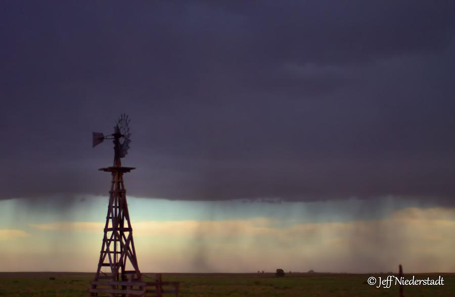 Windmill in the rain Photograph by Jeff Niederstadt