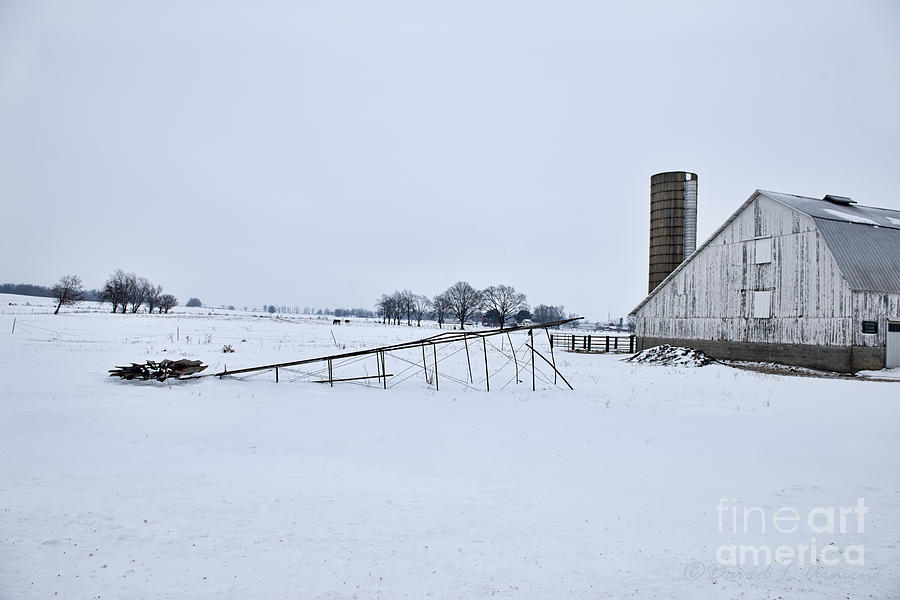 Windmill on its Side in the Snow Photograph by David Arment