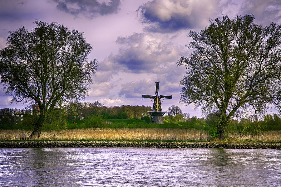 Windmill on Rhine Photograph by James Bethanis