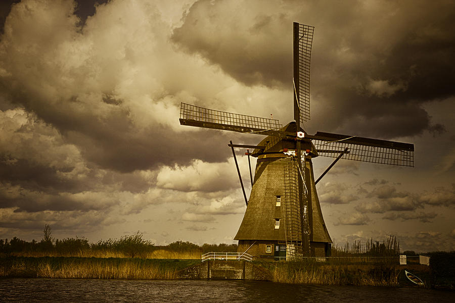 Windmill With Boat Photograph by James Bethanis