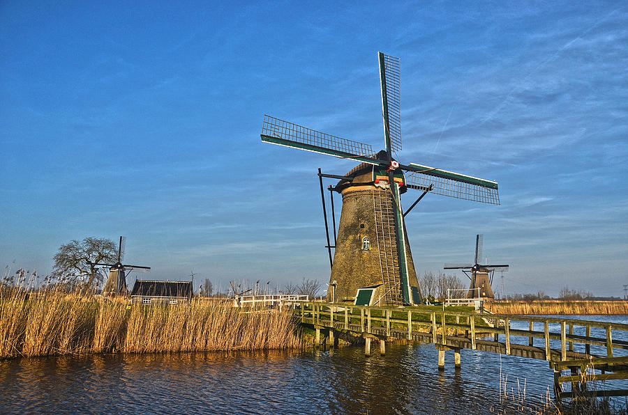 Windmills And Bridge Near Kinderdijk Photograph by Frans Blok