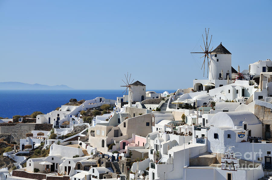Greek Photograph - Windmills and white houses in Oia #1 by George Atsametakis