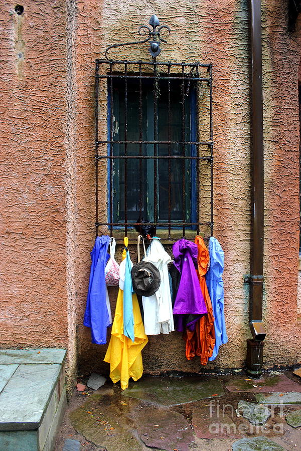 Window Raincoat Rack Photograph by Andre Turner