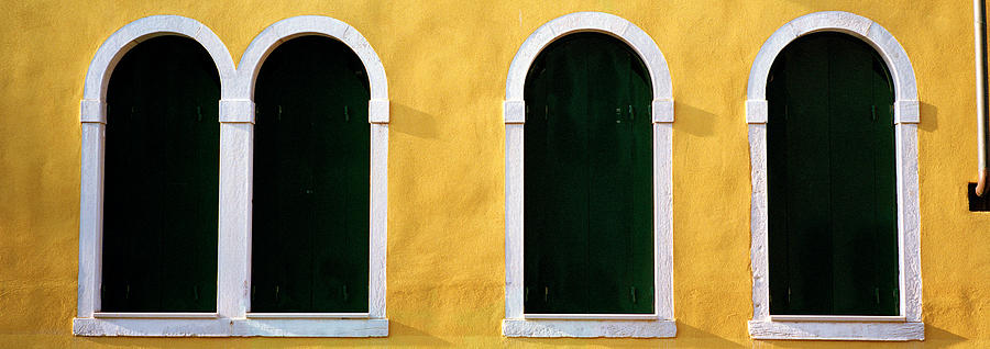 Architecture Photograph - Windows In Yellow Wall Venice Italy by Panoramic Images