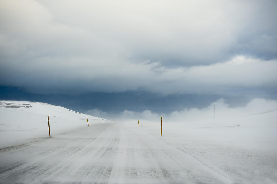 Windy and snowy road at Blonduos in the north of Iceland Photograph by Feifei Cui-Paoluzzo