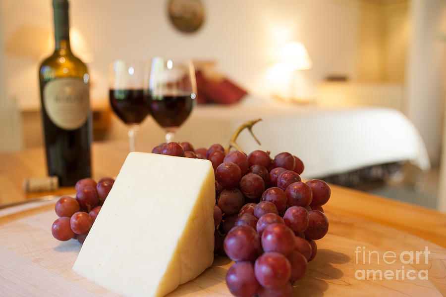 Wine and cheese in a luxurious hotel room. Photograph by Don Landwehrle