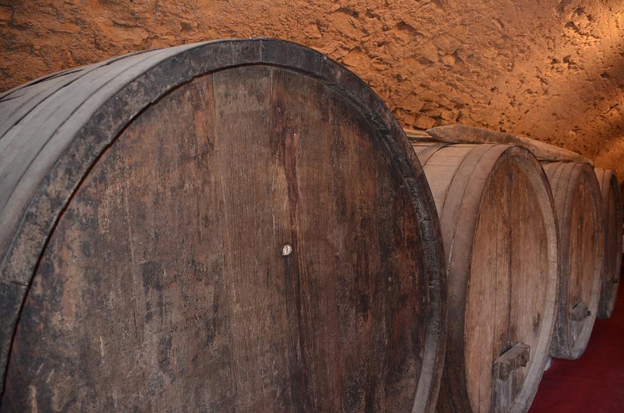 Wine Barrels in Cellar Repose Photograph by Dany Lison