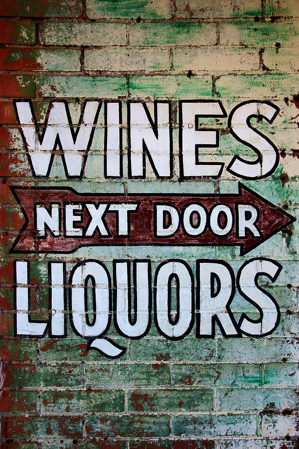 Wines Liquors Next Door Photograph by Daniel Woodrum