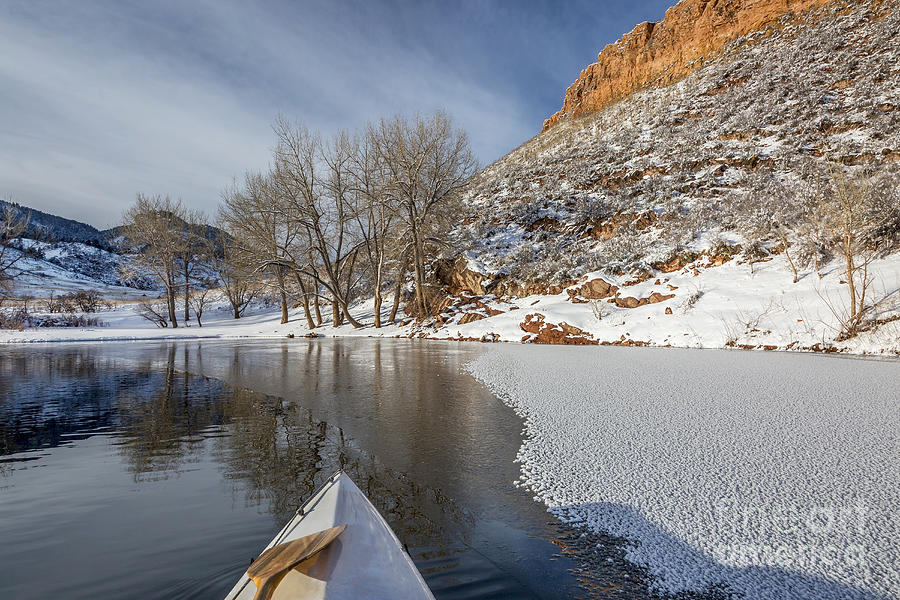 winter canoe paddling in Colorado Photograph by Marek Uliasz