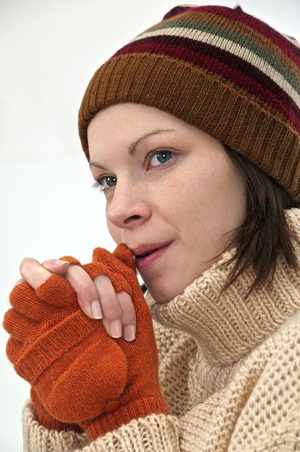 Winter Photograph - Winter hat and gloves by Science Photo Library