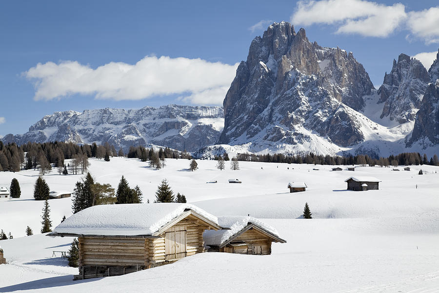 Winter landscape with shed and Langkofel mountain in Dolomites, Italy Photograph by RelaxFoto.de