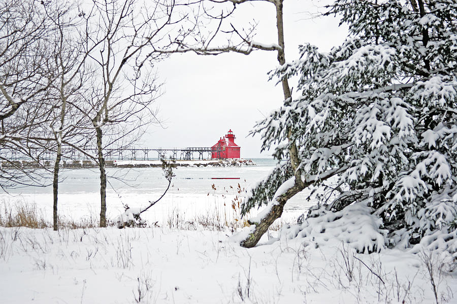 Winter lighthouse Photograph by Ty Helbach