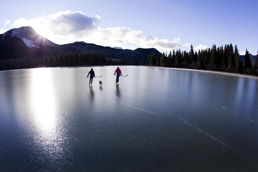 Winter Pond Ice Skate Photograph by GibsonPictures