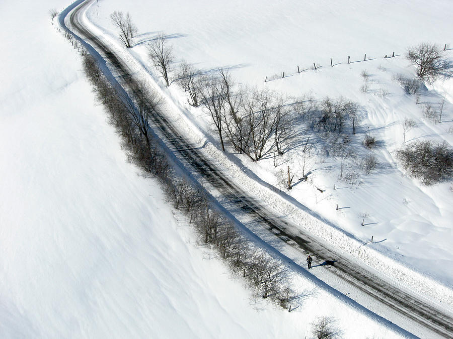 Winter road. Chemin Cross Loop south of Wakefield Quebec. Photograph by Rob Huntley