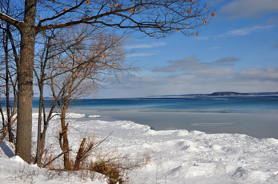 Winter scene on Grand Traverse Bay looking at Power Island Photograph by Diane Lent