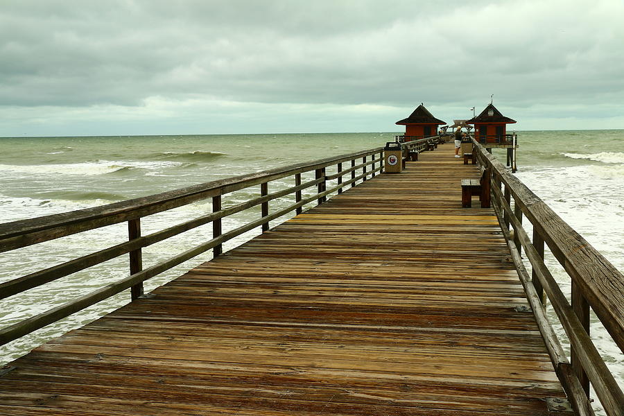 Winter Storm Over Naples Pier Photograph by Christiane Schulze Art And Photography