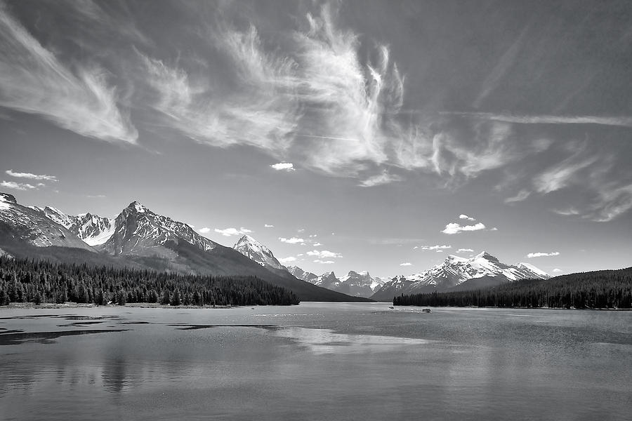 Wispy Clouds Over Maligne Lake Photograph by Stuart Litoff