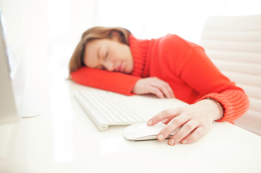 Woman Asleep On Keyboard Photograph by Ian Hooton